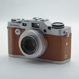 a close up of a camera on a white surface