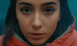 an image of woman looking at the camera