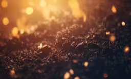 blurry image of some small lights against a black background