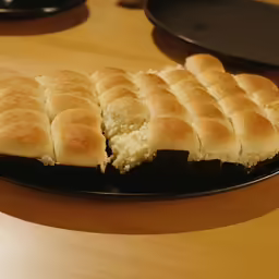 a plate full of biscuits that have been baked together