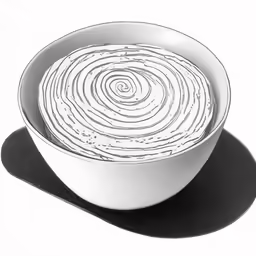 a white bowl sitting on top of a table