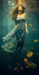 woman in long dress walking underneath water