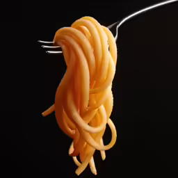 a fork with spaghetti noodles on it