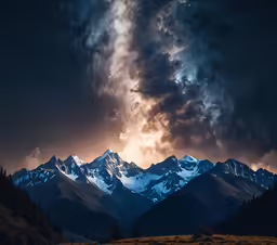 some mountains are in the distance at night