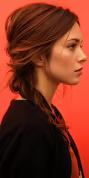 woman with dark sweater on, looking out and to side