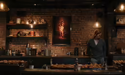 woman cooking in a dimly lit kitchen with a brick wall