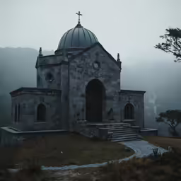 an old church surrounded by mountains with fog