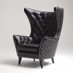 a black chair with a white polka dot pattern on it