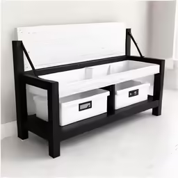 the two drawers are beside a black bench