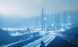 a scenic image of a road in the mountains