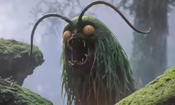 an odd looking creature has long sharp horns