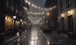 there are many lights strung up over a city street