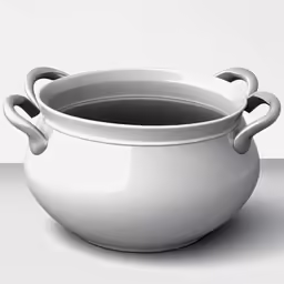 a bowl is sitting on a table with the lid closed