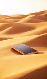 a cell phone is in the middle of a desert