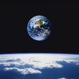 earth from space with clouds below