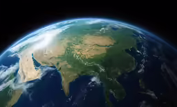 the earth is shown from space with a dark background