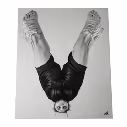 the legs and arms of a woman with hands hanging up