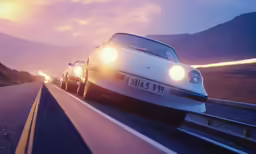 two porsche cars driving on the road with their lights on