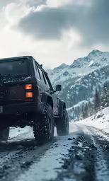the jeep has been driving in the snow on a road