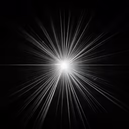 black and white photograph of a bright sunburst