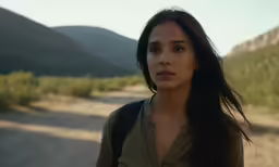 a woman that is looking at the camera