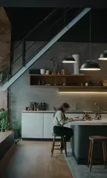 a woman in white sweater eating at kitchen counter with wooden stools