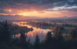 a beautiful view of trees surrounding a large lake