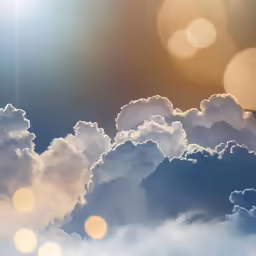 clouds and sunlight with shining halos in the sky