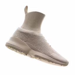 a nike yek sock sneakers is seen in a profile shot