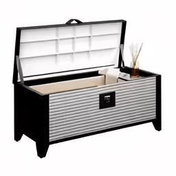 an open storage box with white drawers on the inside