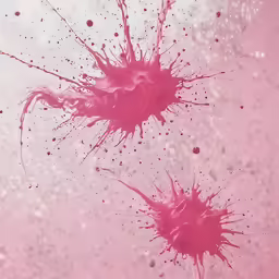two pink ink drops being mixed together