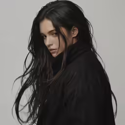 woman with wet hair, posing in studio