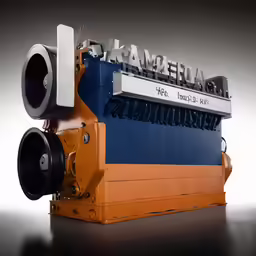 a large engine on display with an american sign in the background