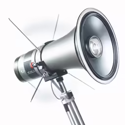 a close up of a speaker on a stand