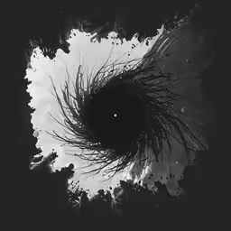 a black and white photo shows a dark hole