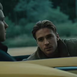 a man sits in his car while a lady looks out the window