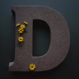 a stone letter with daisies on it