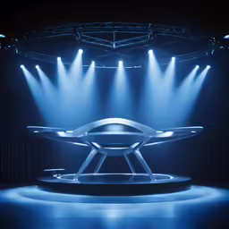 a stage set with several spotlights and chairs