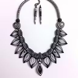 a necklace made of metal and plastic is hanging from a necklace with markers,a necklace with two pencils is shown in this picture