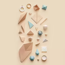several decorative objects including a paper and scissors