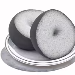two doughnuts are displayed on a plate