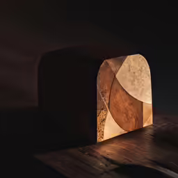this wooden box has an unusual design on it