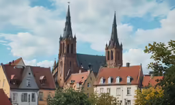 the tall church spires towering over the city