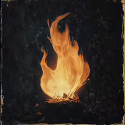 a fire is burning over a dark field