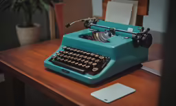 an old fashioned typewriter with the keys pressed open