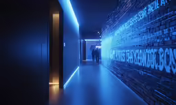 there is a hallway that has a blue light on