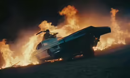 an suv on fire with fire coming out of it