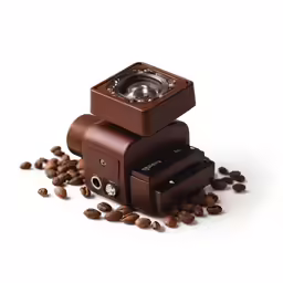 a small camera with some coffee on top of it