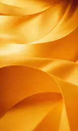 a close up image of yellow fabric