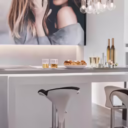 a modern counter has a photo behind it